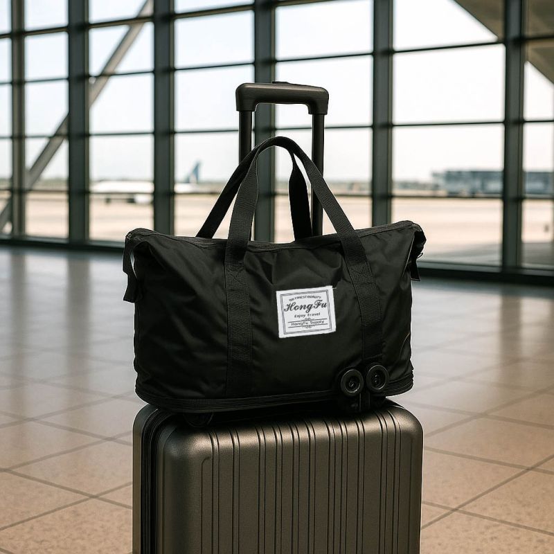Torba podróżna na kółkach składana turystyczna pojemna 3 rozmiary czarna - obrazek 12