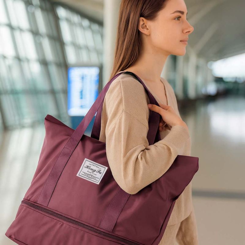 Torba podróżna na kółkach składana turystyczna pojemna 3 rozmiary fioletowa - obrazek 11